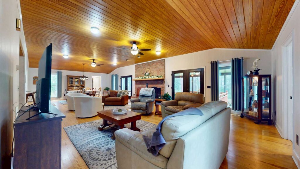 Open living area with wood ceiling at 103 Plantation Lane