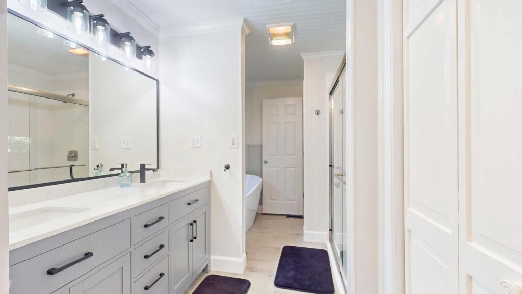 Bathroom with double vanity at 103 Plantation Lane